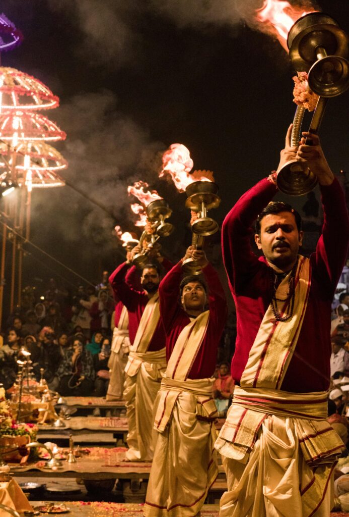 Priests perform the traditional Ganga Aarti ceremony on the Ghats of Varanasi, India.